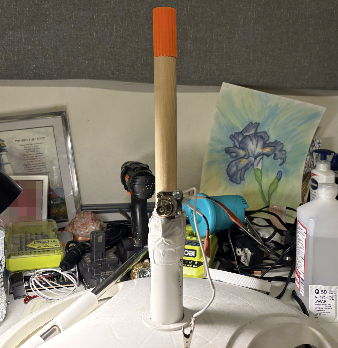The existing bottom portion of the original paint-pole antenna